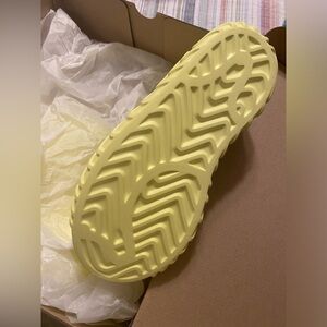 Brand new adidas rain boots, foam material, 7.5 women size, vibrant yellow.